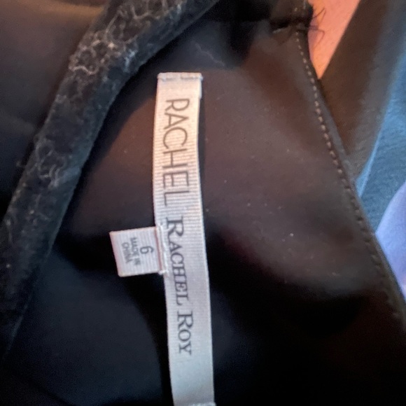 Above the knee dress, skirt has a faux wrap opening, zipper closure in back. - Picture 4 of 4